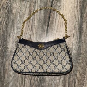 Gucci Beige and Black Women's Bag 
PLEASE MESSAGE ME BEFORE BUYING IT